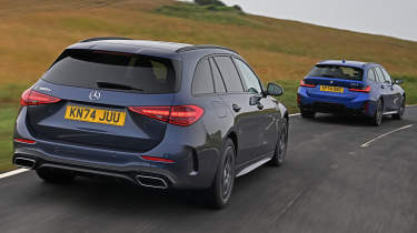 BMW 330e vs Mercedes C 300 e twin test - rear angled